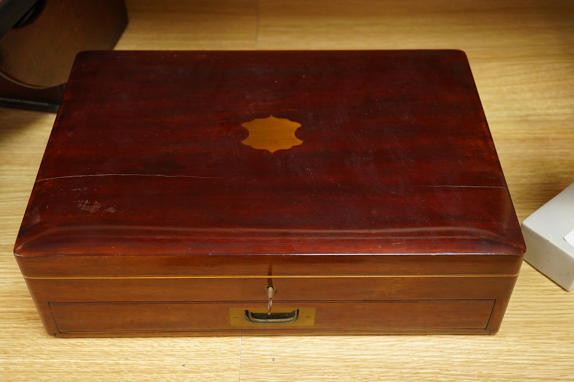A set of six late Victorian bone handled fish knives and forks and a set of twelve mother of pearl handled dessert knives and forks, mahogany cased
